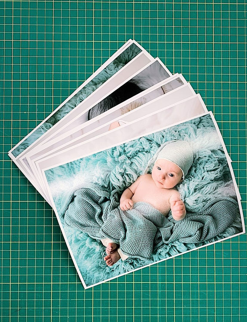Small stack of semi-gloss photo paper prints