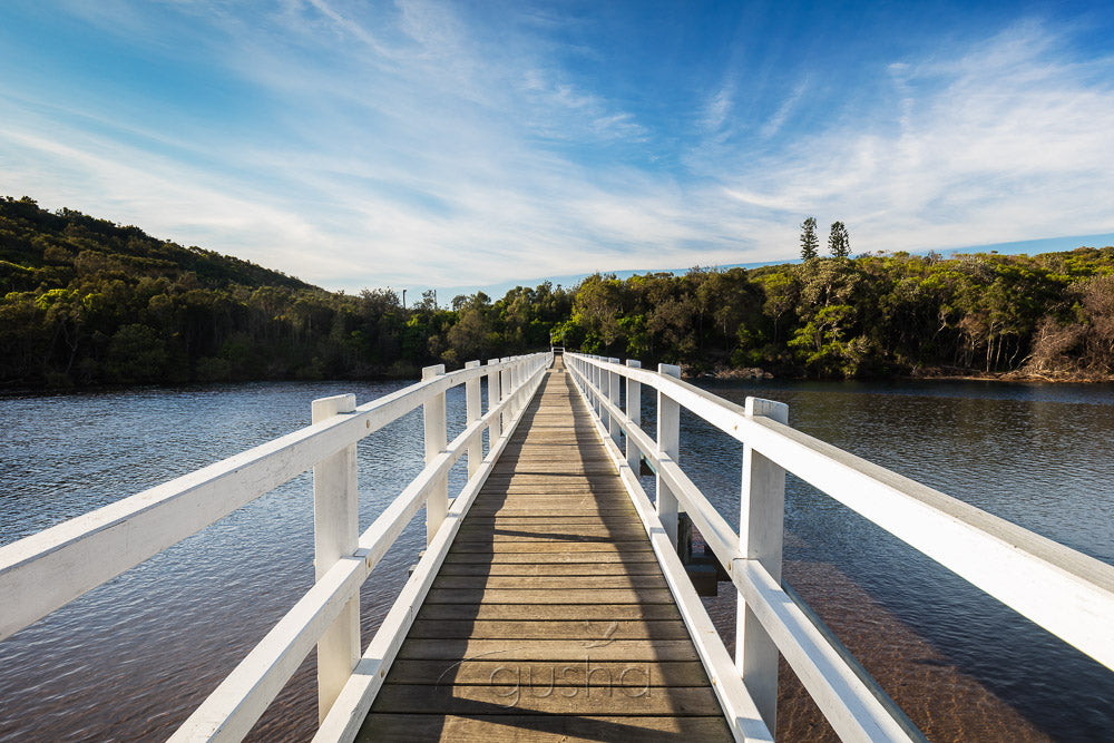 Dramatic skies high above the footbridge at Korogoro Creek, Hat Head