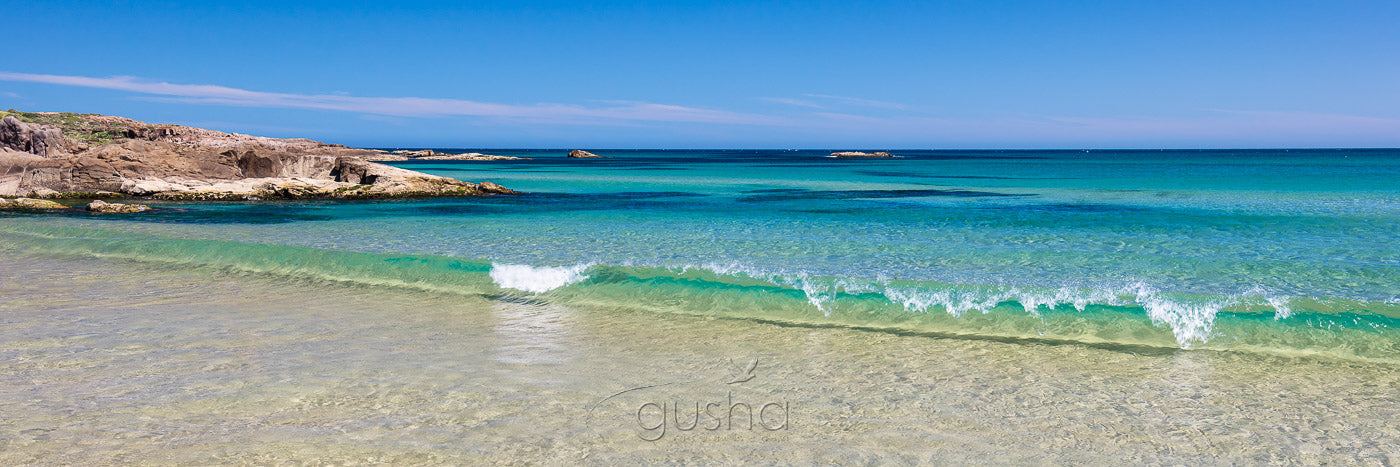 A perfect summer shorebreak rolls into Birubi Beach.