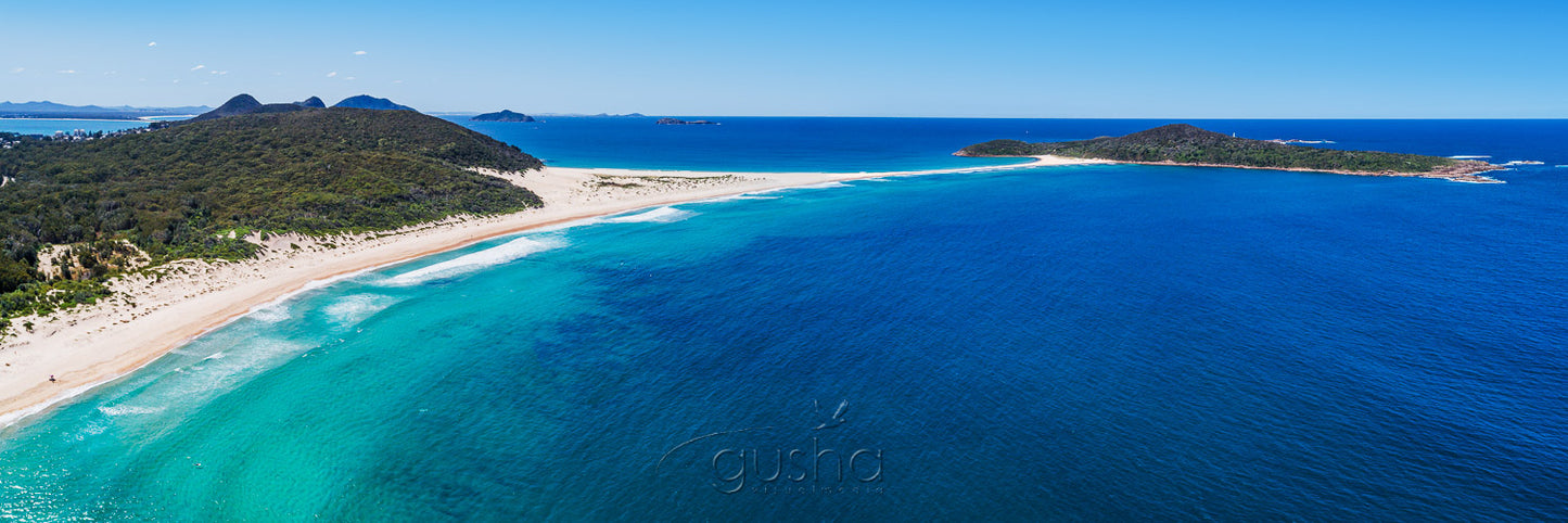 Aerial photo over Fingal Bay and Point Stephens.