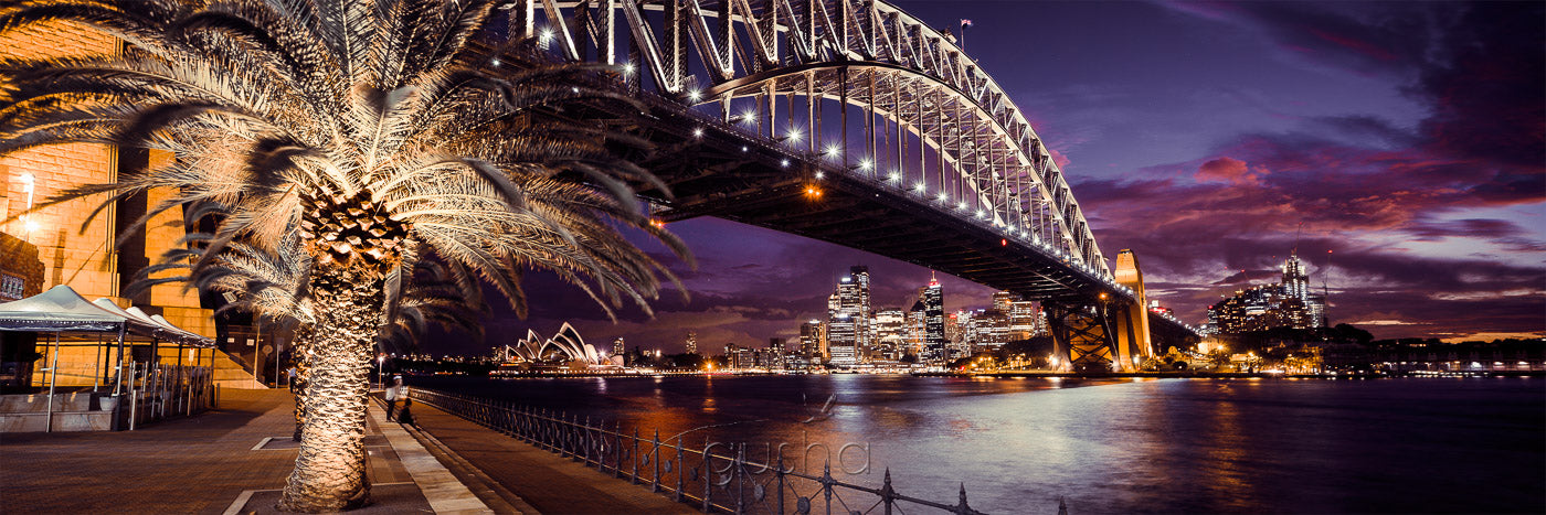 Storm clouds at sunset over Sydney Harbour Bridge.