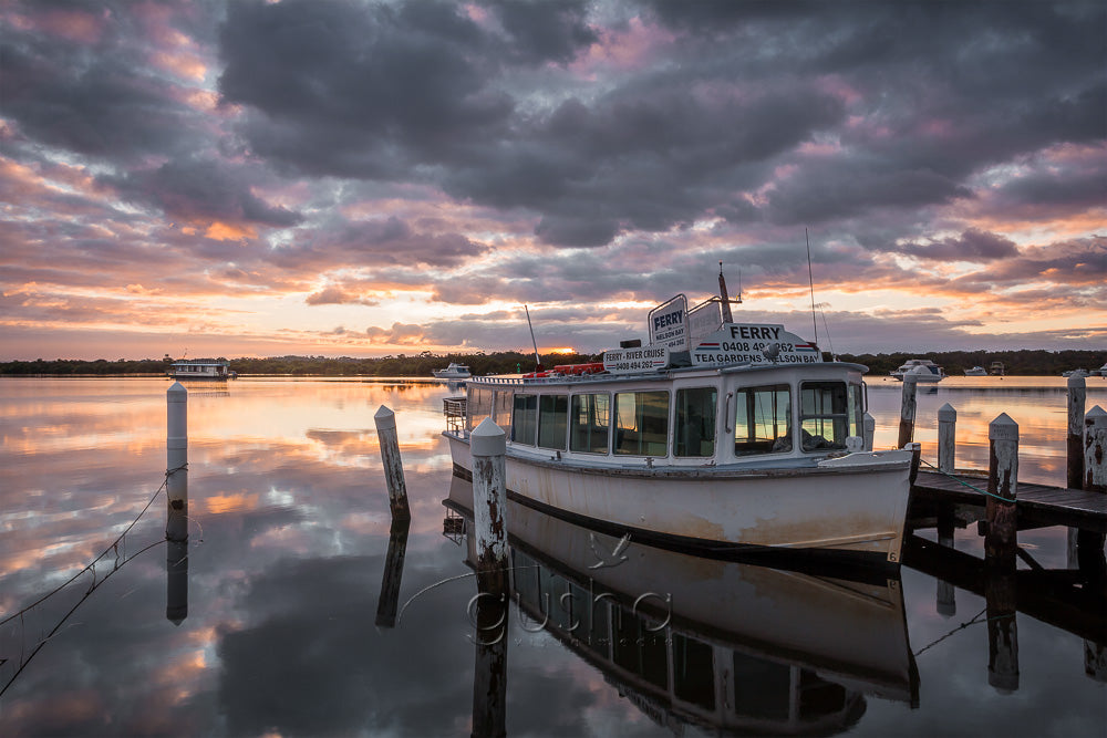 A photo of a ferry docked at Tea Gardens, Australia