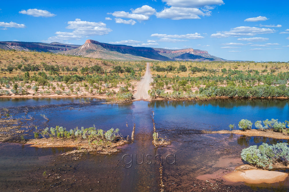 Depending on the direction of approach, the Pentecost River crossing marks the beginning or the end of the Gibb River Road adventure. Rising high in the distance, the Cockburn Range provides a breathtaking backdrop.