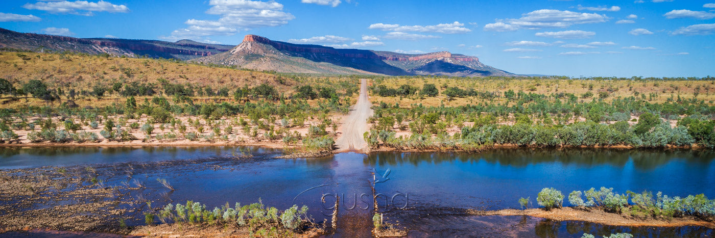 A panoramic photo of the iconic Pentecost River crossing can mark as either the beginning or the end of the Gibb River Road adventure. Rising high in the distance, the Cockburn Range provides a breathtaking backdrop.