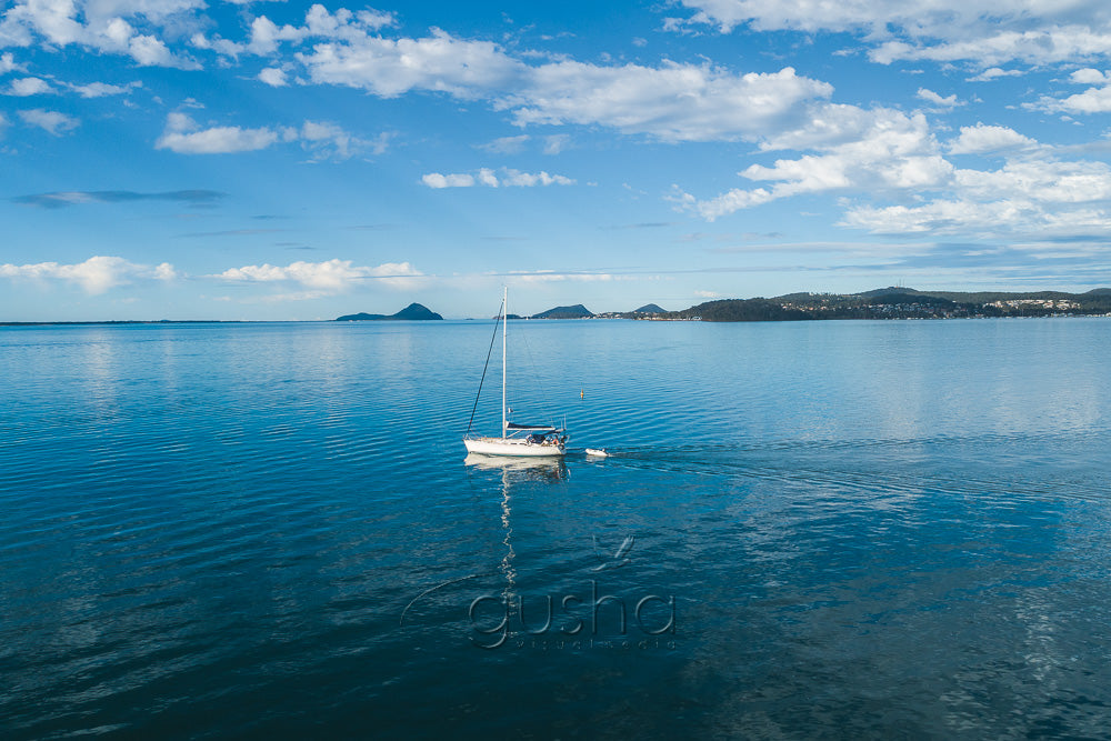 A photo of a yacht sailing at Port Stephens at Port Stephens, Australia